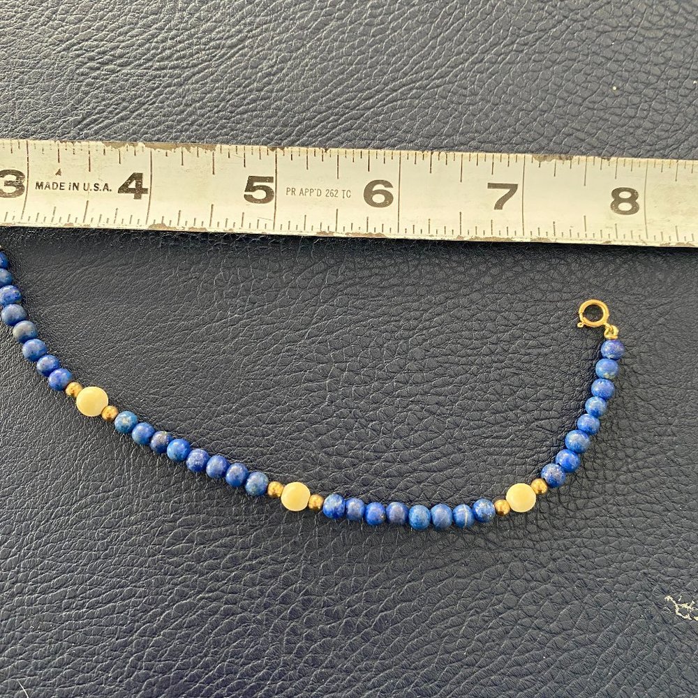 Blue and white beaded bracelet